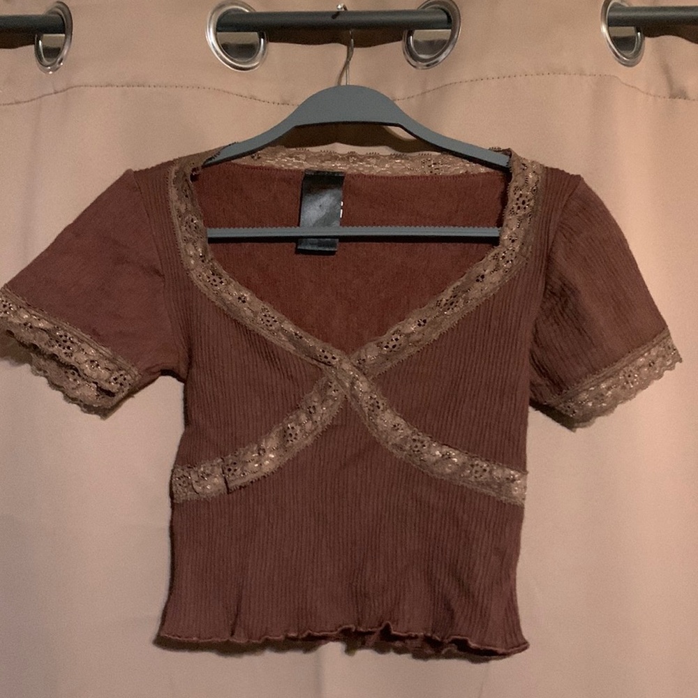 Brown short sleeve cropped top with lace detail.  Size M